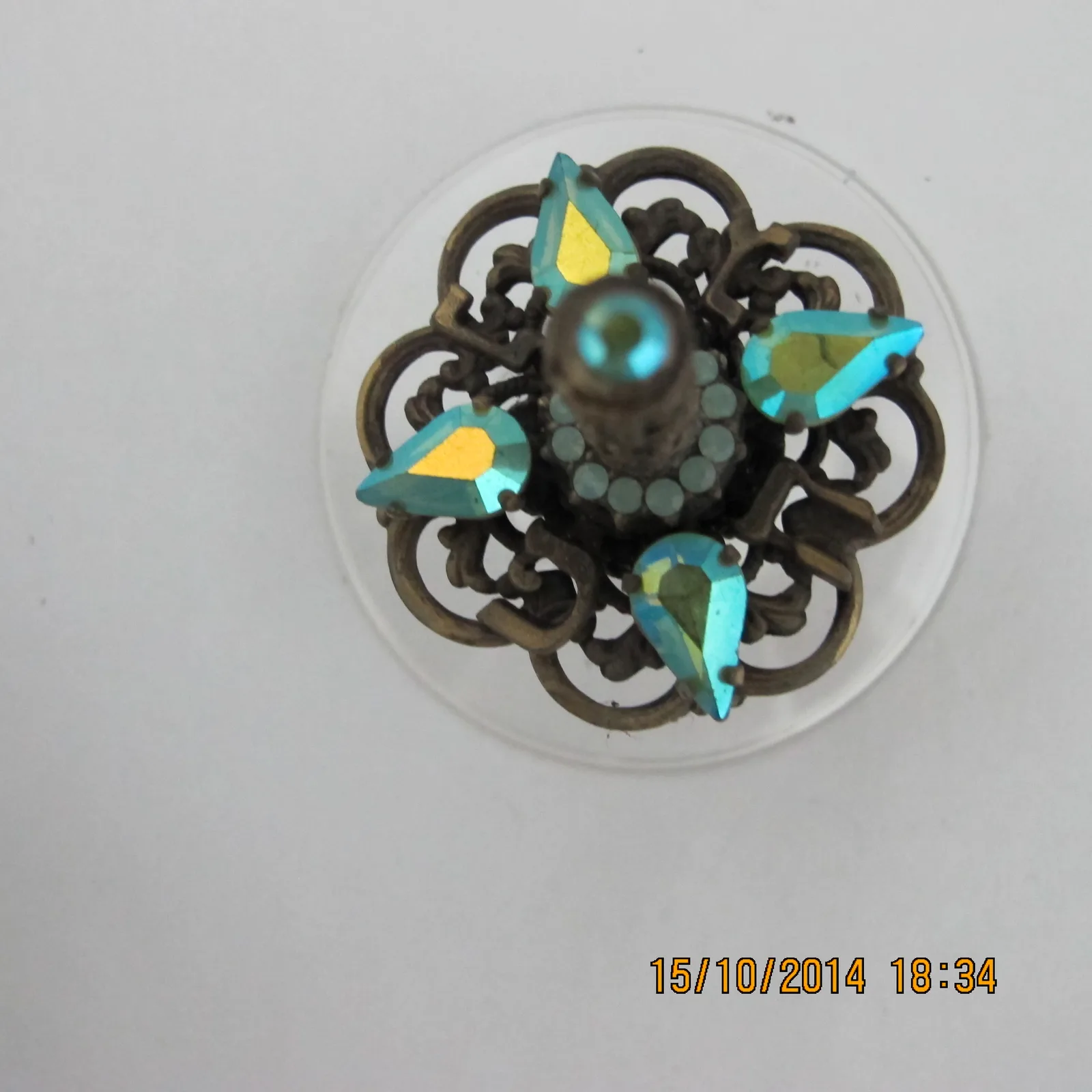 Stone-encrusted spinning top
