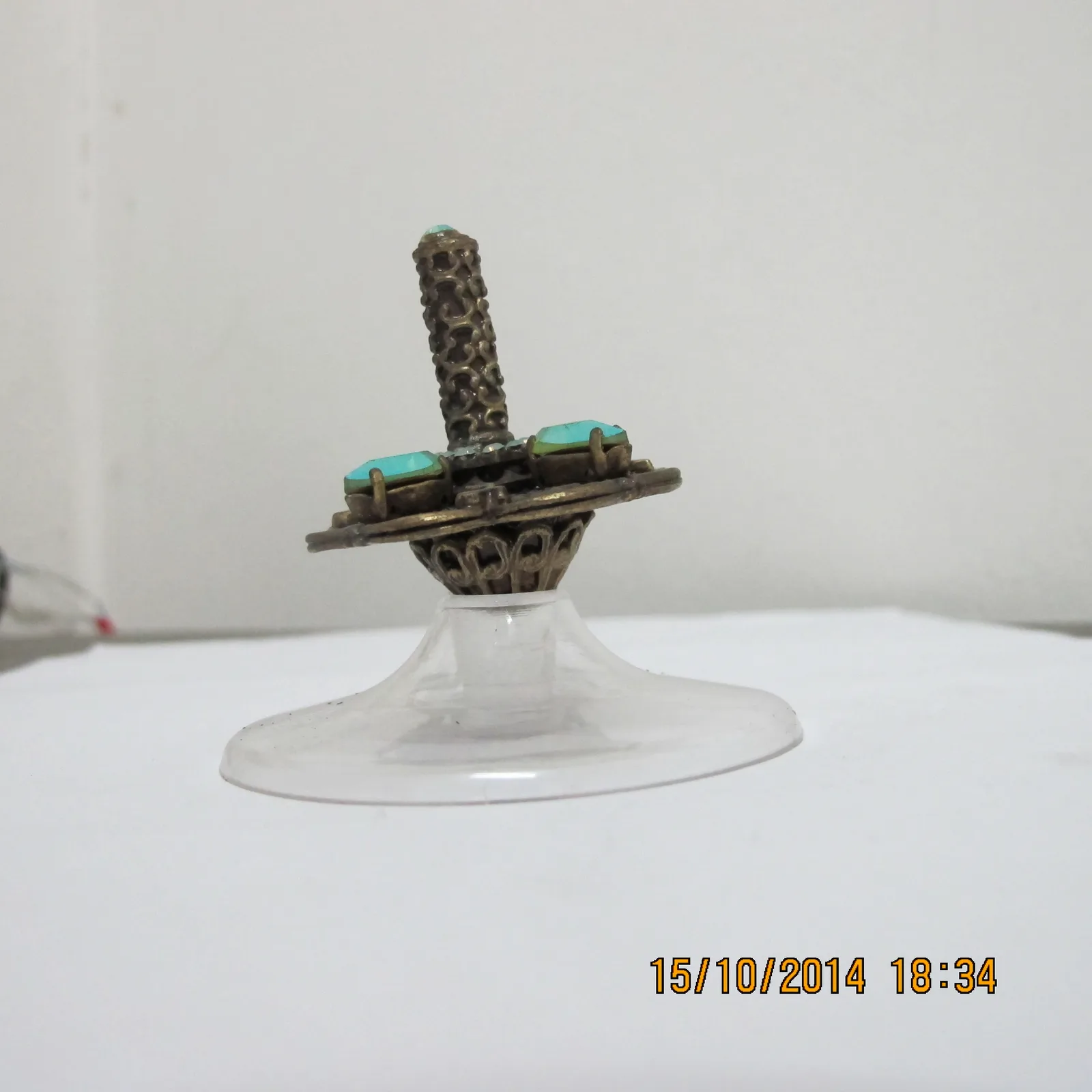 Stone-encrusted spinning top