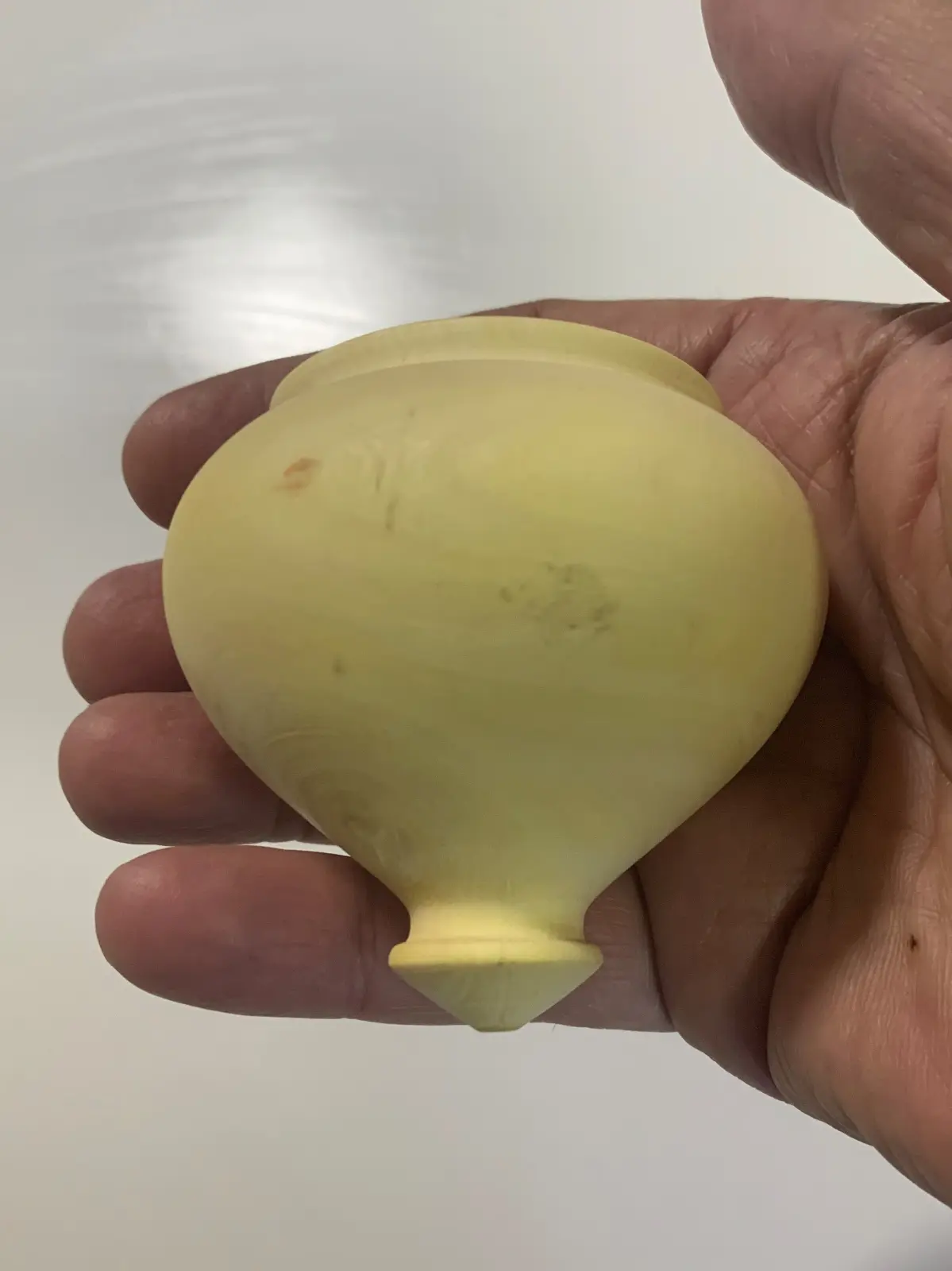 Lemon wood spinning top by Moshe Gazit