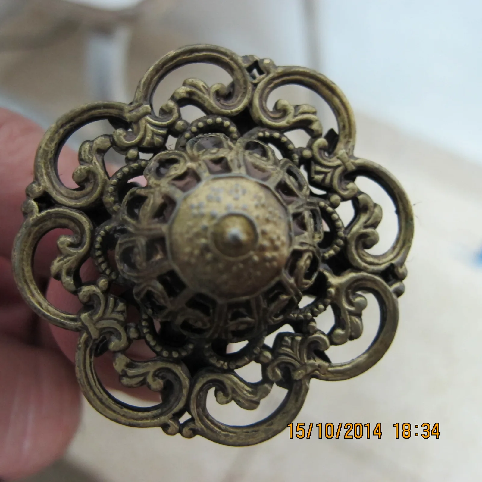 Stone-encrusted spinning top