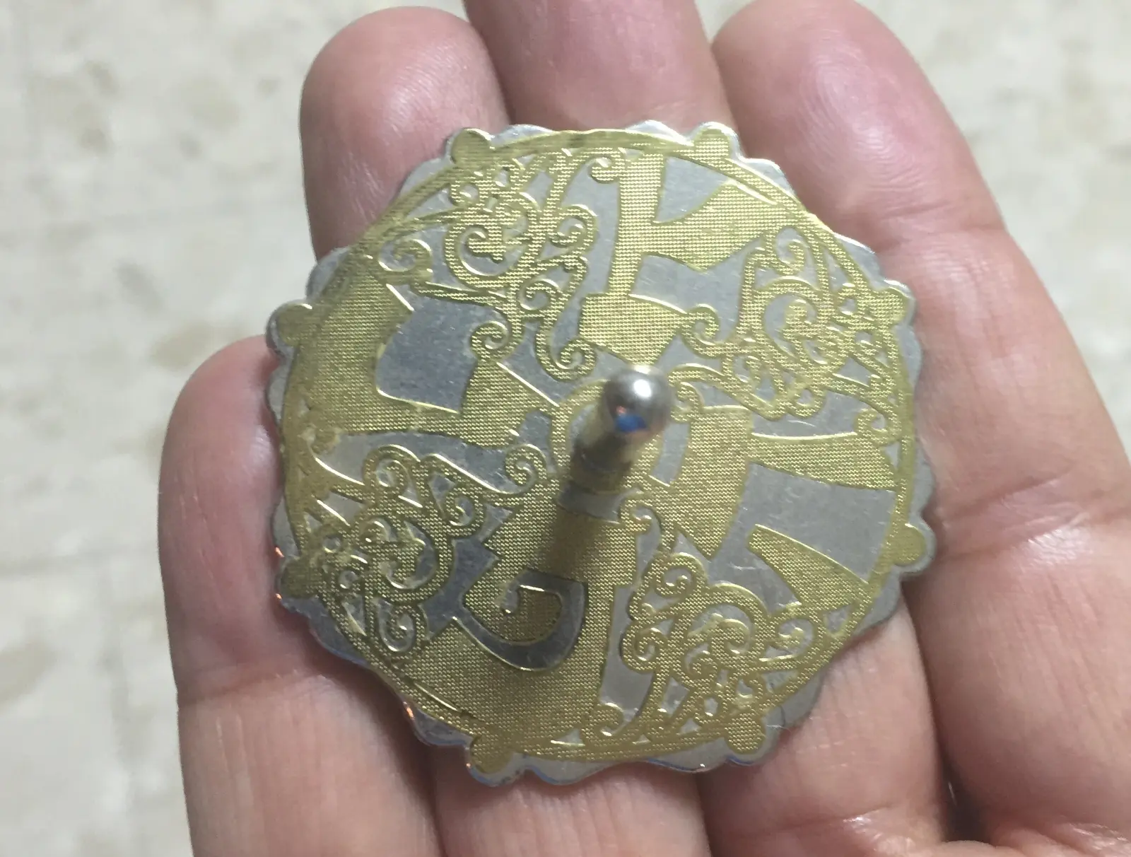 סביבון מתכת  וזהב של ארט יודאיקה