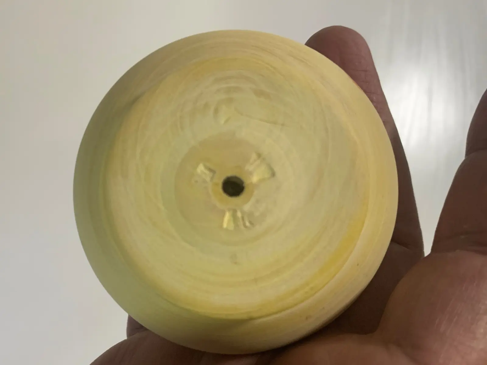 Lemon wood spinning top by Moshe Gazit