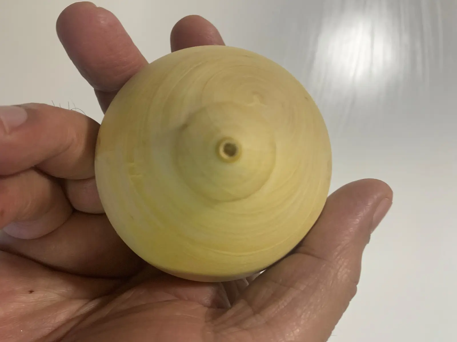 Lemon wood spinning top by Moshe Gazit