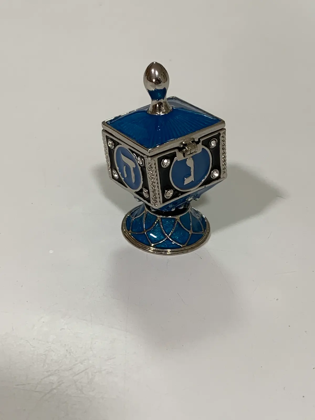 סביבון  קופסה תכלת של קרן קופאל