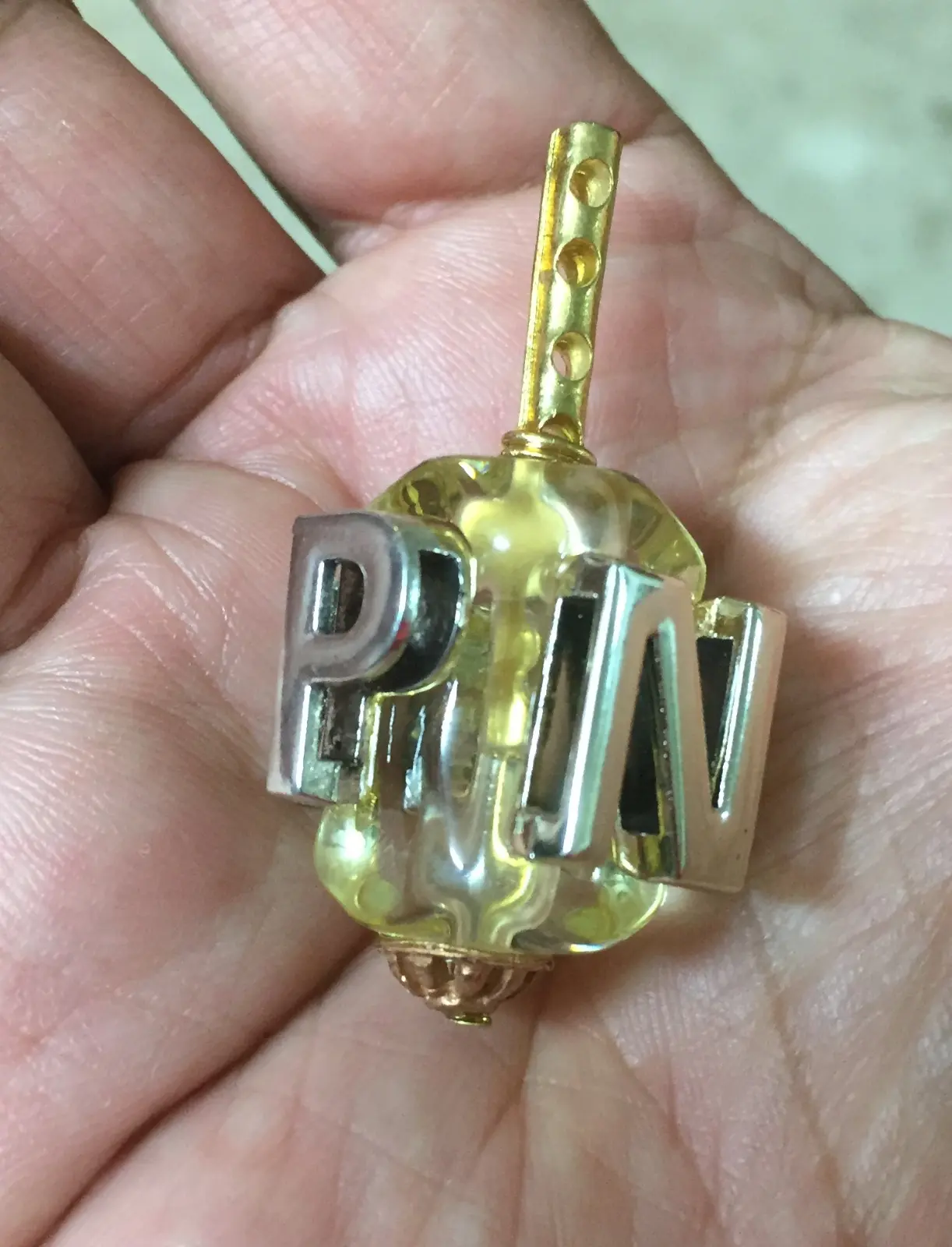 סביבון חרוז עם כיתוב N,G,H,P