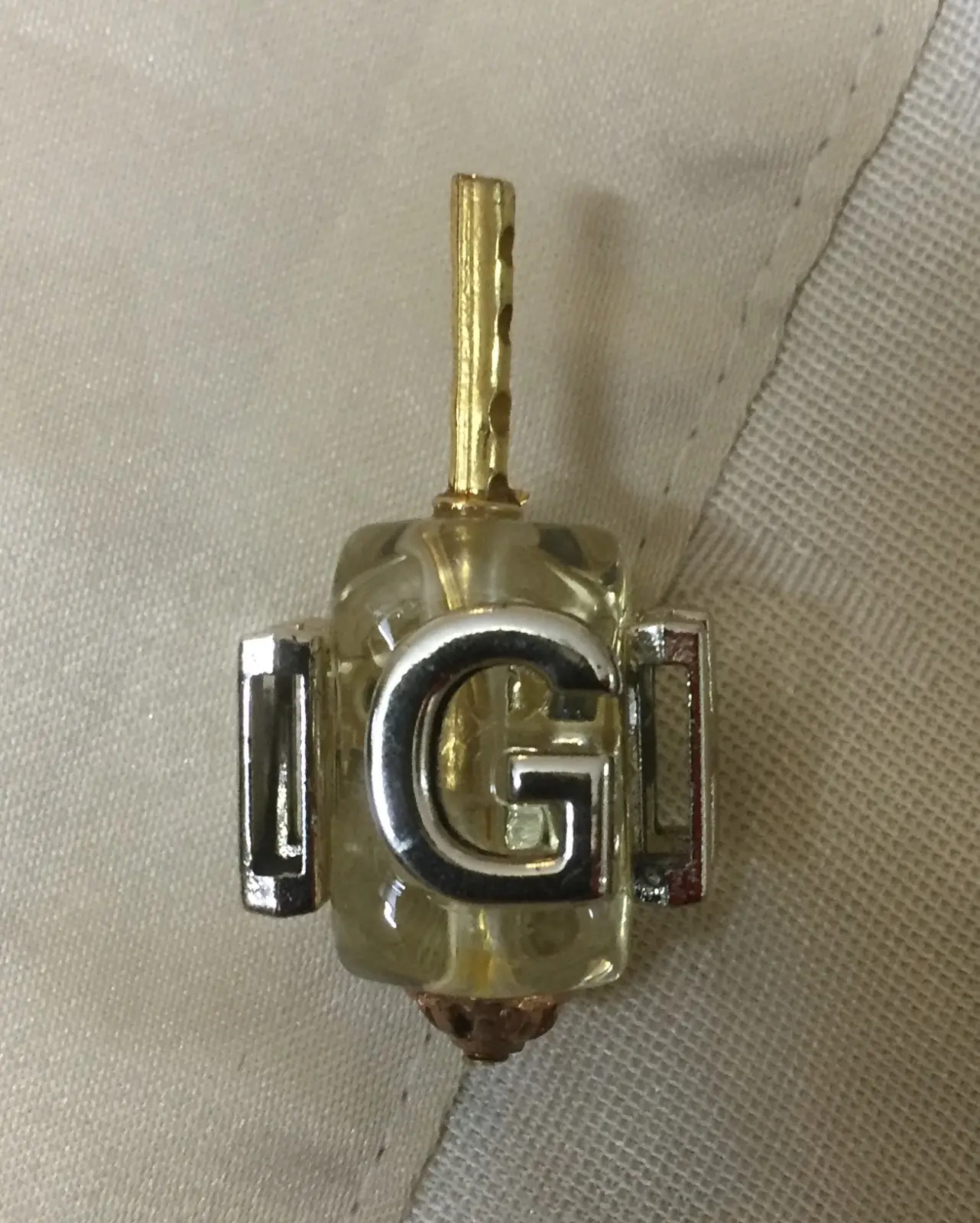 סביבון חרוז עם כיתוב N,G,H,P