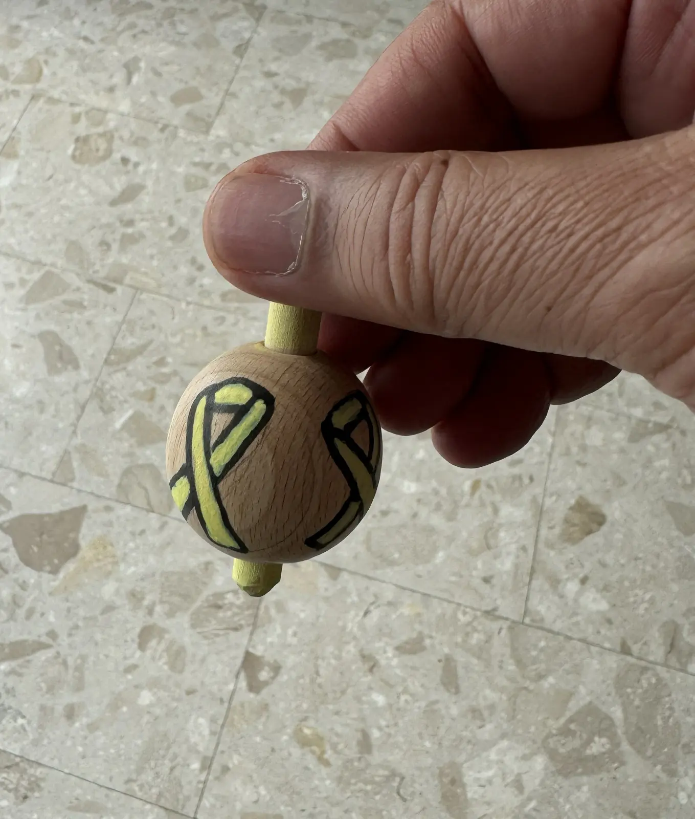Spinning top with the symbol of the kidnapped