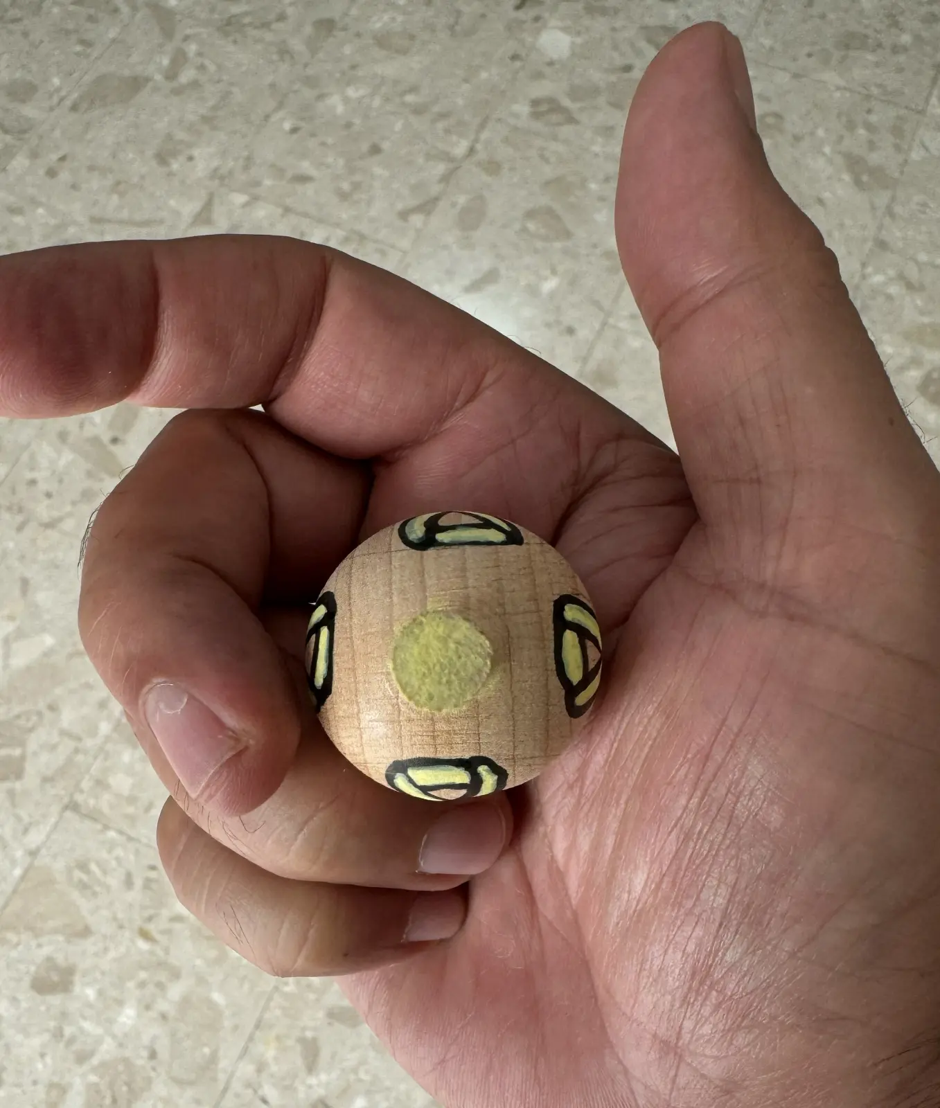 Spinning top with the symbol of the kidnapped