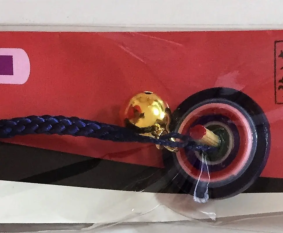 סביבון קמע שבעת הצבעים עם פעמון