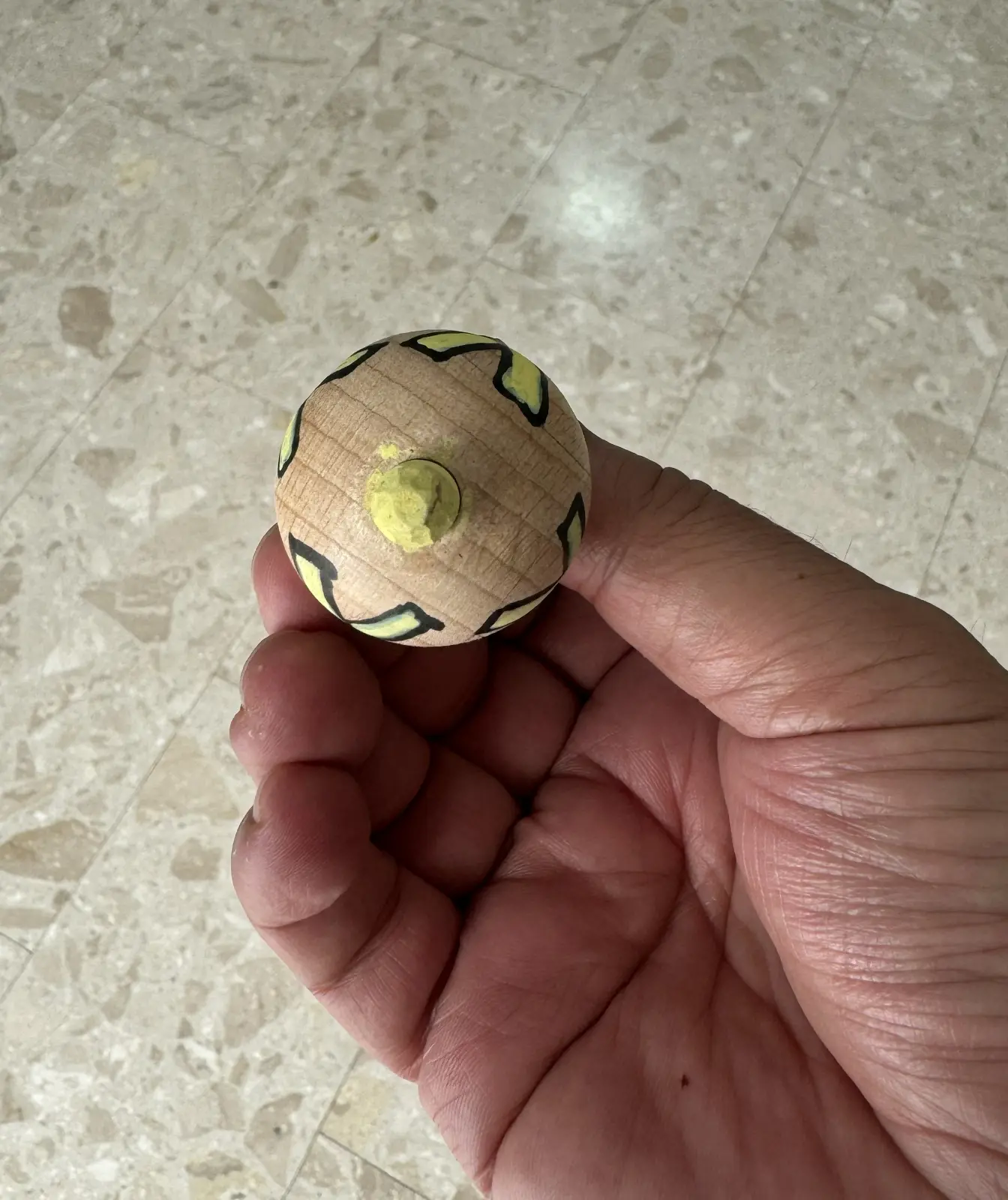 Spinning top with the symbol of the kidnapped