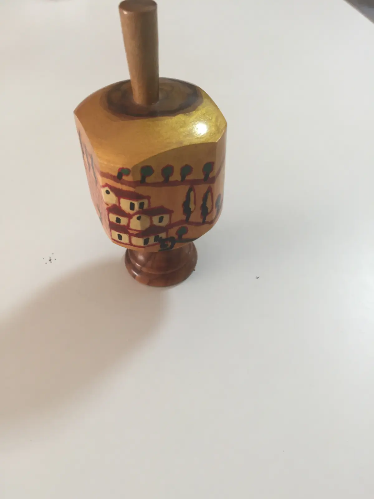 סביבון עץ זית של זינה