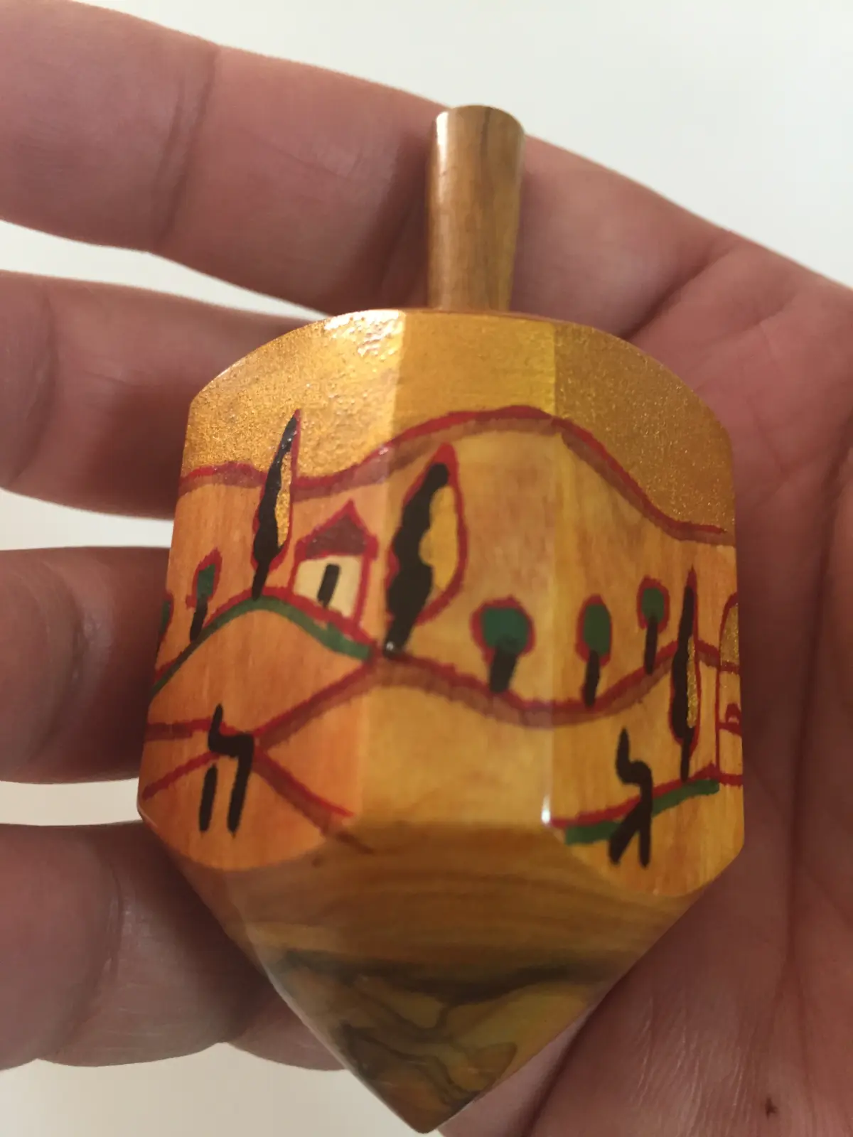 סביבון עץ זית של זינה